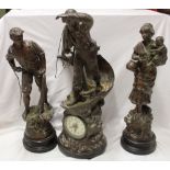 An unusual spelter mantel clock garniture with circular decorated dial,