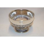 An Edward VII silver circular pedestal bowl with gadrooned decoration,