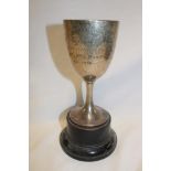 A silver circular goblet shaped trophy cup "Truro District Canine Society 1936", 6½" high,