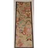 An old embroidered rectangular floral panel,