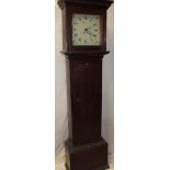 A 19th century longcase clock with painted 11" square dial and 30-hour movement in stained pine