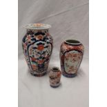 A 19th century Japanese Imari pottery tapered vase with floral decoration,