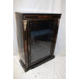 A Victorian ebonised and brass mounted rectangular display cabinet with fabric lined shelves