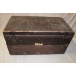 An old metal-bound military trunk with original galvanised lining with hinged cover,