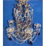 An iron six-branch ceiling chandelier with glass lozenge droplet decoration,