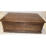 A 19th century stained pine rectangular trunk/bible box enclosed by a hinged lid,