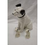 A modern china HMV seated dog figure and a pair of RCA Victor china HMV pepper pots
