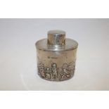 An Edward VII silver oval miniature tea caddy decorated in relief with numerous classical figures,