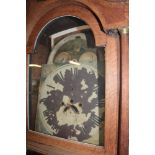 A 19th century longcase clock in parts for restoration comprising 14" painted arched dial with