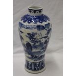 A 19th century Chinese tapered vase with blue and white painted figure decoration,
