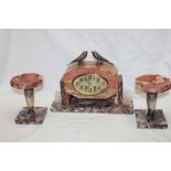 A 1920/30s Art Deco mantel clock garniture by Bayle of Bordeaux with oval dial in sienna marble
