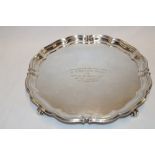 A George VIR circular tray with pie crust edge and engraved text, Sheffield marks 1945,