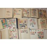 Twelve albums/stock books containing a large selection of mixed World stamps