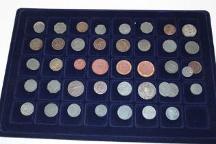 A selection of Imperial German currency including four Saxony porcelain coins and over forty