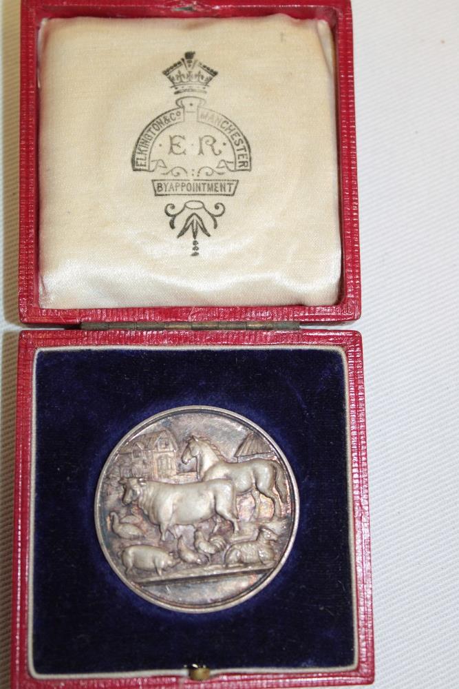A 1910 silver Ashton-Under-Lyne Agricultural Society medal presented by Lady Grey in velvet lined