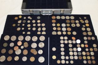 An aluminium collector's coin case containing a collection of various coins comprising various GB