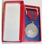 A 1953 Coronation silver medal,