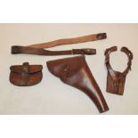 Various brown leather Sam Browne fittings including military holster, ammunition pouch,
