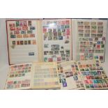 Four albums/stock books containing a selection of mixed World stamps