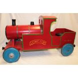 A 1950'S Leeway wooden child's pedal toy train 44" long