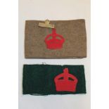 Two First War Lord Derby Scheme arm bands in khaki and green cloth with red crown insignia,