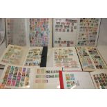 Seven stock books containing a selection of mixed World stamps and others,