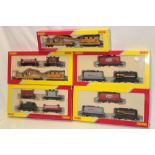 Hornby 00 gauge - four mint and boxed packs of goods wagons including tanker wagons,