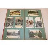 An album containing a selection of various black and white and coloured postcards including some