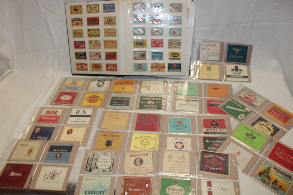 An album containing a selection of cigarette packet fronts,