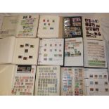 Twelve albums and stock books containing a large collection of GB and World stamps