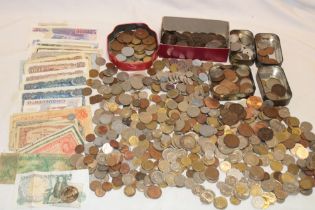 A large selection of mixed GB and Foreign coins, bank notes etc.