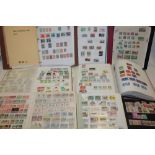 Twelve albums/stock books containing a large selection of World stamps