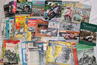 Various motorcycle racing related volumes and magazines including The Official TT Review 2007;