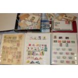 Two stock books containing a collection of Malaysia stamps together with relating loose stamps etc.