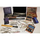 A cased set of drawing instruments in lined rosewood case,