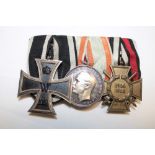 A group of three Imperial German First War medals :- First War German Iron Cross,