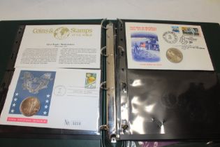 An album containing a selection of medallic postal covers including 1991 USA silver eagle dollar