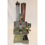 A selection of mine surveying accessories including aluminium and brass mounted folding tripod,