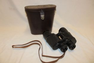 A pair of Russian 7X50 binoculars in leather carrying case