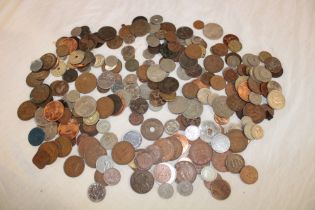 A tin containing a large selection of Foreign coins