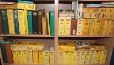 A large selection of various cricket related volumes including Wisden's Cricketer's Almanacs 1951