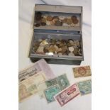 A box containing various World coins and bank notes including some silver examples