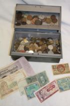 A box containing various World coins and bank notes including some silver examples