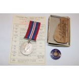 A Second War 1939-45 War medal in box of issue with slip and a Royal Marine's Old Comrade's