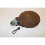 A First War German water canteen with original fabric cover