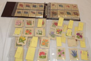 An album of various silk cigarette cards and loose silk cigarette cards including Kensitas flowers,