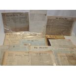 A selection of various old newspapers and paperwork including The Courier December 1809,