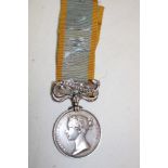 A Victorian 1854 Crimea medal with Sebastopol bar named to Revd. W.