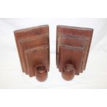 A pair of teak bookends with attached barrel containers "From the Teak of H.M.S.