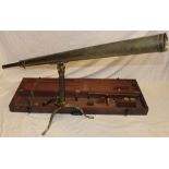 A large 19th century brass telescope by Smith of London with 55" tapered body on folding brass